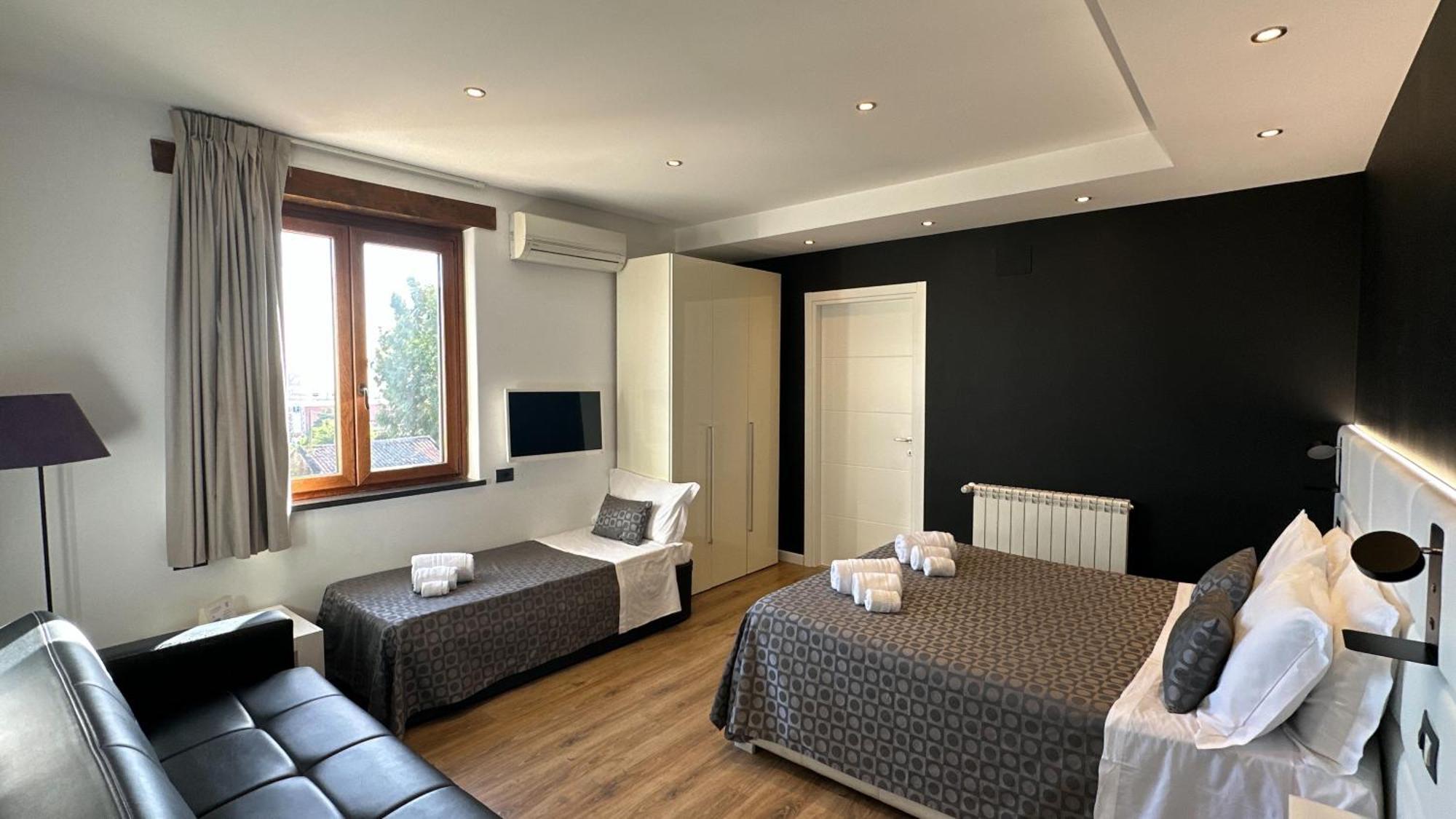 Ottomood B&B And Apartments Tremestieri Etneo Habitación foto